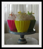 Cupcakes - Golden cupcakes with white frosting.