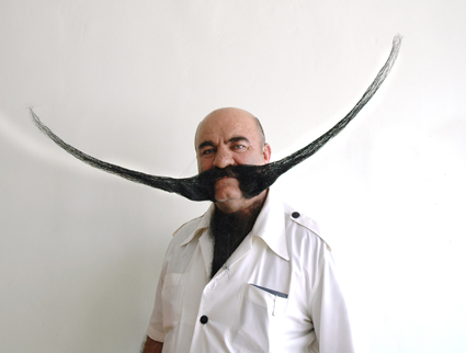 different people - a men with a big cute moustache