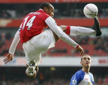 henry - Being brought up in the tough neighborhoods of Les Ulis, a heavily urbanized suburb of Paris, in a family of Antillean immigrants that didn't have it easy, Thierry Henry was only 6 when Claude Chezelle recruited him at the local youth team, CO Les Ulis.  He spent five years at the club and at age 11, he played his first game here, before joining US Palaiseau in 1989, where he would meet Coach Jean-Marie Panza, which Henry refers to as his mentor even today. When Panza moved to Vity-Chatillon in 1990, the 13 year old Henry followed his mentor to the team, where he spent 2 years.