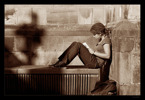 Reading  - A guy sitting alone and reading book