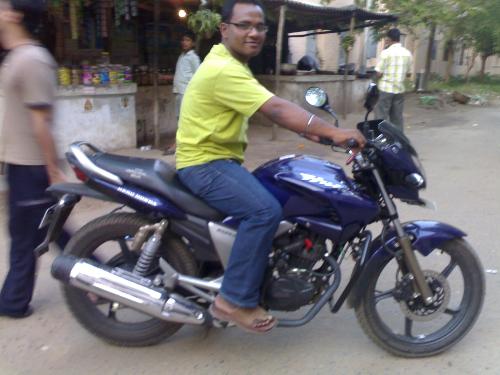 biker boy - my classmate with his bike posing for a snap
