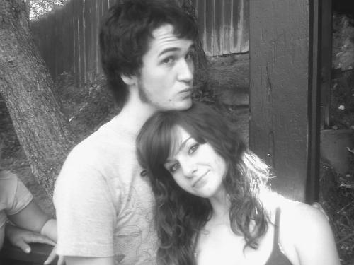 Me and my handsome boyfriend. - Me and my handsome boyfriend in line at Magic Mountain. We were hot and miserable if you couldn't tell.