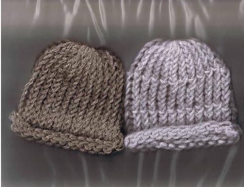 2 of my 6 first baby hats - Used my scanner and a heavy white notebook to get this to work