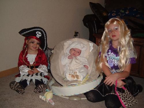 My children - This is my children, My youngest daughter, my only boy, and then my oldest daughter, Jaelynn is two and was a little pirate, TJ was a little lamb and he is a little over a month, then we have Ariana she is 7 and she was Miss Hannah Montana. THey looked so cute this Halloween.