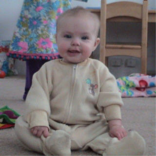 My baby Nora - This is my sweet baby Nora Glenn, sitting up all by herself.  She is 6 1/2 months old (born April 5, 2006).  Isn't she cute.