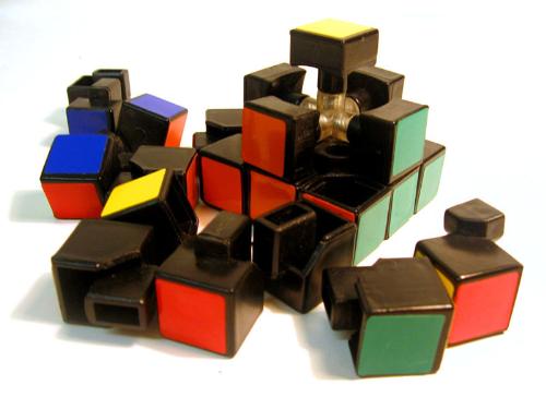 Disassembled Rubik's Cube - Well, at first I really couldn't solve every side of the cube. Thinking that I have already solved one side, I end up ruining it when I start solving another side. I would break it apart and build it right to somehow 'solve' it but, now-a-days, I only open it up to add lubrication. (^_^ )