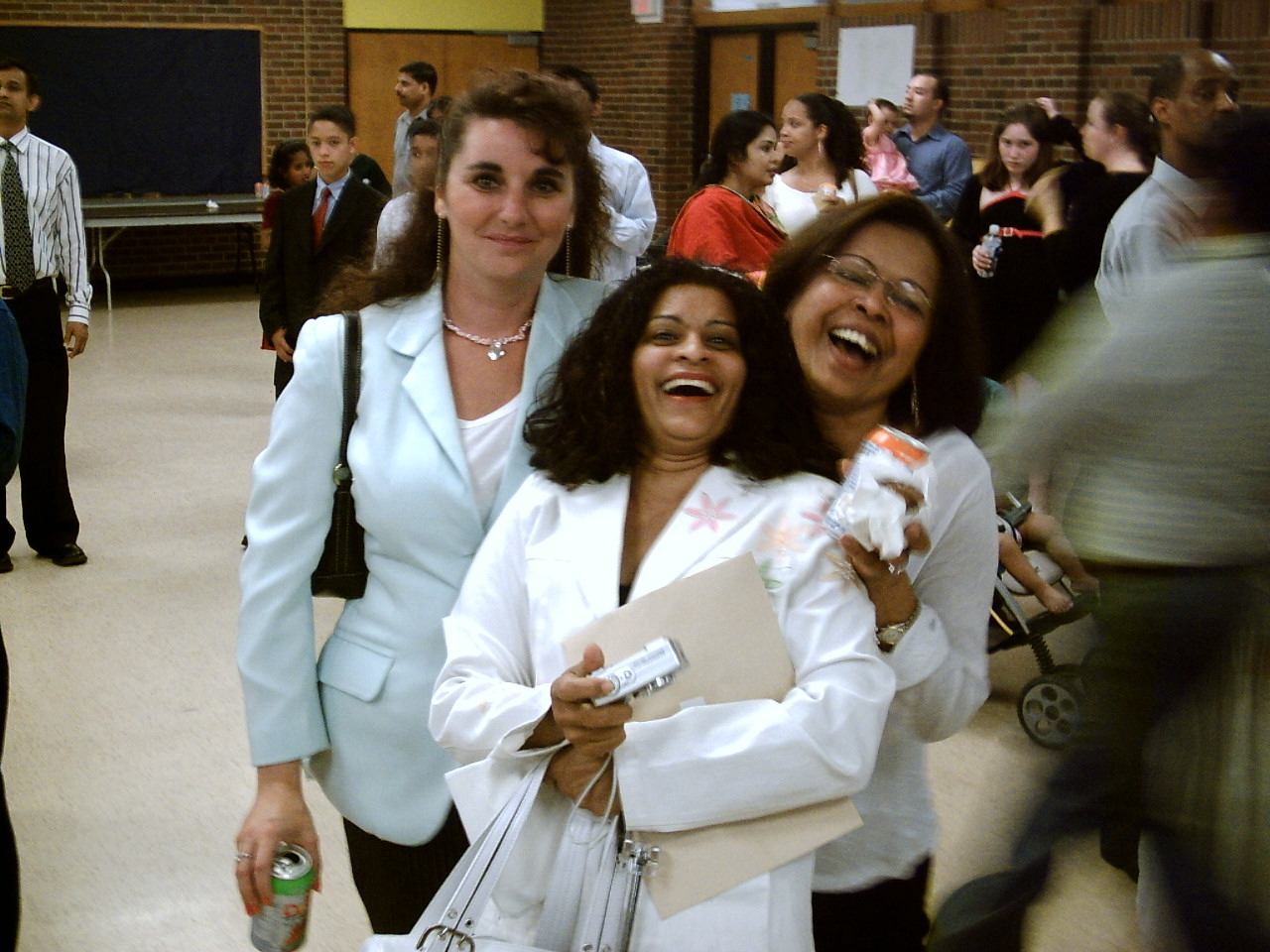 Me with a couple of friends  - This picture was taken a my son's grade eight graduation. This is me and a couple of the other mothers/friends after the ceremony.