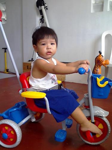 my one year old son.. - he is riding his first ever bike given to him by his dad