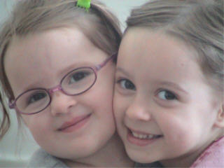 Brenna and Meagan - Sisters by birth, Friends by choice.  I love this picture of my two oldest girls.  Brenna was 3 1/2 and Meagan was almost 6 when this picture was taken this past May (they are almost 4 and 6 now).