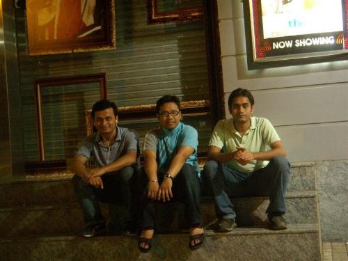 Roommates sitting in front of mall... - Thee of us sitting in front of Juhu PVR Mumbai. I am the one in extreme right.