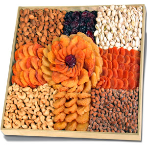 Dried Fruit And Nuts. - A tray of mixed dried fruit and nuts.