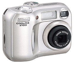 my digital camera - this is a gift from a friend... i really treasure this! very cute!