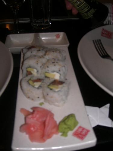 sushi - i love to take pictures a lot especailly if the subject is my favorite food sushi. this picture was taken during my husbands company part in one of the japanese restaurants here in California. just looking at the picture makes me hungry for sushi...=)