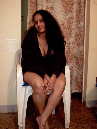 lady in a long t-shirt - on the chair... relaxing..