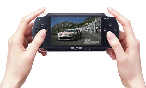 Playstation Portable - A snapshot of a woman's hand holding a Playstation Portable (conveniently known as PSP)