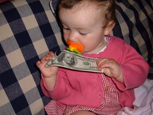 Is money making is so easy - This photo is showing that how baby can make money