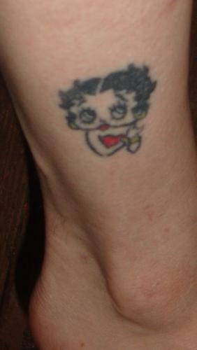 tattoo - This was my first tattoo. My best friend and I drove to KC from Iowa for the weekend and just did it for fun. It definitely was an experience. It DID hurt. Oh my goodness, I'm just glad it was small. I love and try to channel Betty Boop, I love that she is sexy but also smart, and cute, and in control, plus the boys like her.