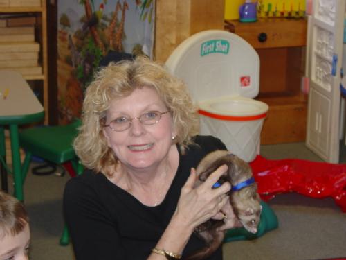 Holding a tiny puppy. - Holding and loving a tiny tiny puppy.