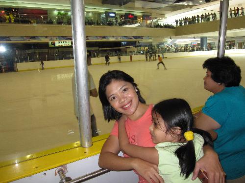 my sis and me - taken at the SM-MOA skating rink