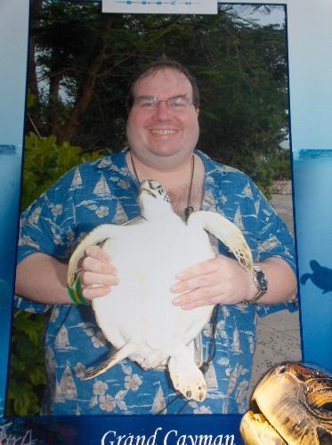 Me holding turtle - This was taken at the Turtle Farm in Grand Cayman during my October 2008 cruise.
