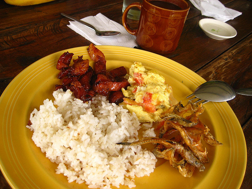 Breakfast the Filipino Way - We usually have rice, fried eggs, dried fish and sweetened beef