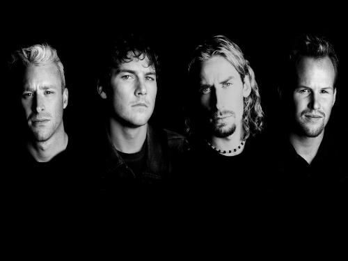 Nickelback - A black and white photo of Canadian band, Nickelback.