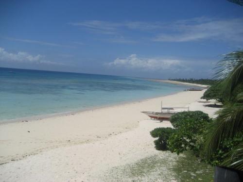 Beach in our Island - This is the beach in our island in Philippines, I enjoy walking in beach every morning and take a quick swim. Its because probably the beach is just in our backyard.