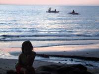 beach - I love photography. This is one of my first try to capture some beautiful sceneries. I have my daughter as a model here.