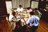 family prays together -  praying before having a meal