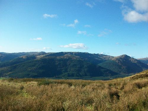 Scottish Mountains - This Photographs was taken in late October 2008 when I went on the road trip to Scotland. This Picture was taken almost from the top of the mountain, I couldn't reach the top as it's way higher. Sunny day it was, I got really lucky as most of the people should know that it rains in Scotland almost everyday.