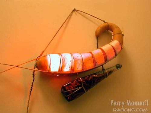 Caterpillar - Perry Mamaril's Lamp - This caterpillar lamp made by Perry Mamaril is made from bamboo, rattan, and hand made papers.