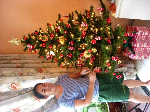 Dressing the Christmas Tree - My maid here helping me to dress up the tree.