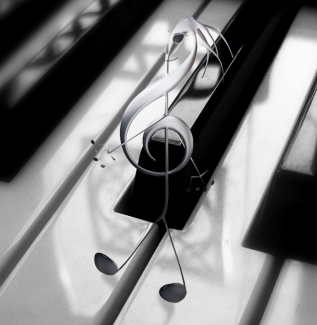 piano - A treble clef dancing on piano keys.