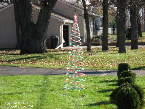 Neighbors Decorations - A cool looking tree when lit up.
Neighbors Decorations - A cool looking tree when lit up.