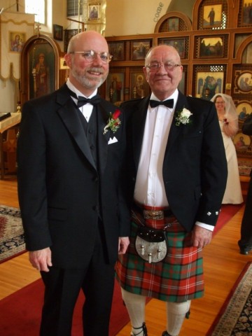 Scotsman at a wedding - The father of the bride and the groom get their picture taken at the wedding. 