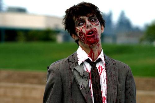 Zombies/Survival - A picture of a zombie in a suit