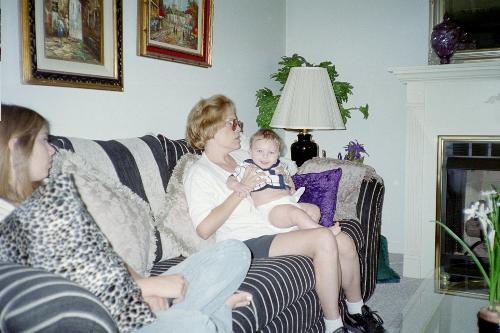 My younger daughter and me with grandson! - Just my daughter and I sitting with my grandson and enjoying the time with family!
