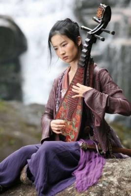 mandarin girl - Chinese girl playing an instrument