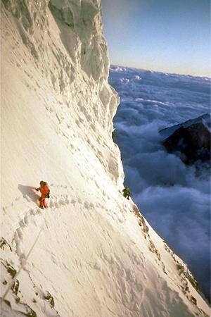 K2 bottleneck - Ed Viesturs and his partner approaching the summit of K2, the second-highest mountain in the world (from sea level), and the second or third most dangerous to climb.