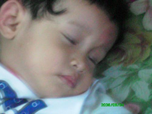 My sleeping baby - One tired kid, sleeping without a care in the world.
