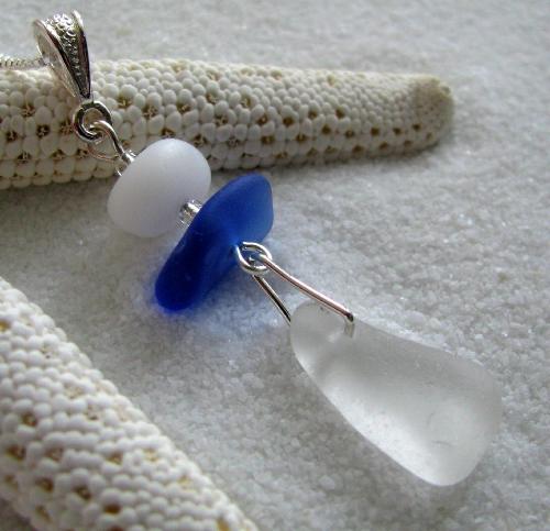 Mermaid's Teardrop Necklace - 3 beautiful pieces of authentic sea glass are the foacl beads on this handmade piece of jewelry. The three pieces of sea glass hang on an 18' sterling silver chain.