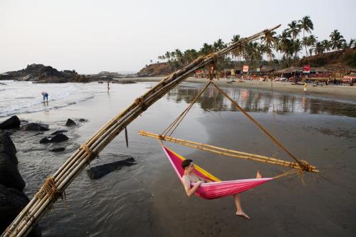 Goa Beaches - Relaxing on one of the Goa's beaches .