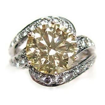 5ct light brownish orange round diamond ring set i - This ring is a very beautiful ring and it's heavy due to its' 'PLATINUM' band!