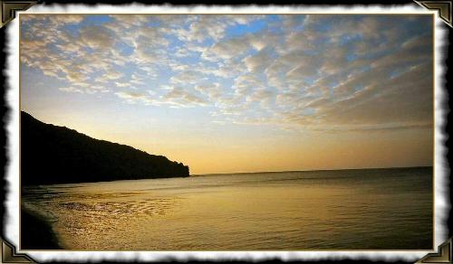 Dawn at Palaui Island, Phillipines - I love taking pictures of the sunset. It brings out magical colours from the sky and gives agolden hue to the surroundings. This was taken from one of my trips in the northern region of the Philippines, in an isolated island facing the last landmass of the country. A postcard moment for me.