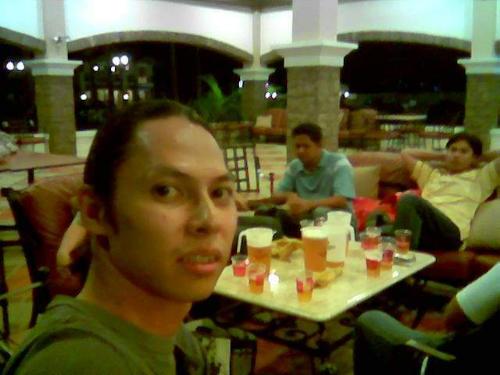 The Saints are Drinking... - This is a photo of me and my old band 'The Saaints' drinking a few pitchers of San Miguel Beers...