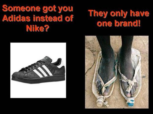 Slippers - A child in Africa with an improvised slippers out of a used water bottle.