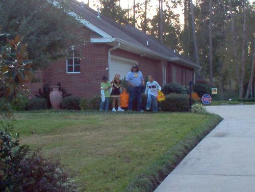 Kids - At houses Trick or Treating.