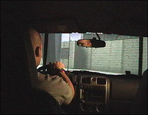 A Veteran Playing A Car Driving Simulator - A snapshot of a veteran who gets benefits in playing a car simulation game.