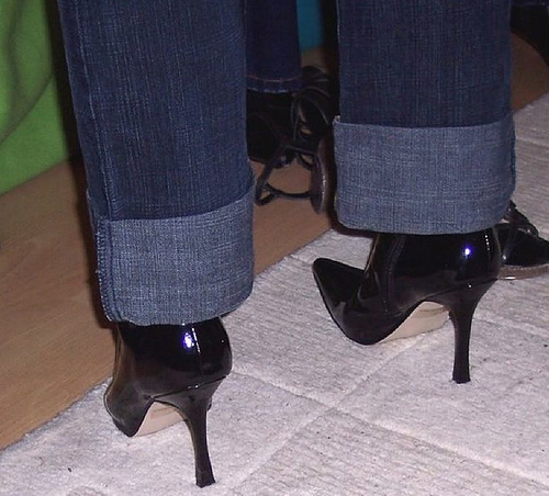 high heeled boots - A pair of high heels in boot style with jeans