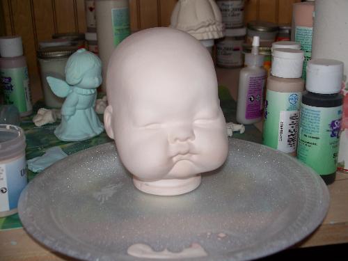 baby head - Here is my desk you can also see a kissing angel they come in sets. baby head - Here is my desk you can also see a kissing angel they come in sets.